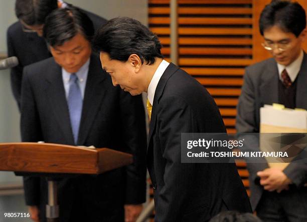 Japanese Prime Minister Yukio Hatoyama enters the room to start his press conference at the prime minister's official residence in Tokyo on March 26,...