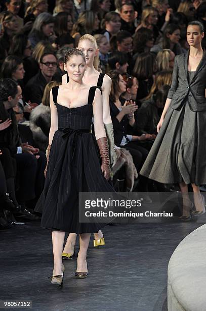 Model Laetitia Casta walks the runway during the Louis Vuitton Ready to Wear show as part of the Paris Womenswear Fashion Week Fall/Winter 2011 at...