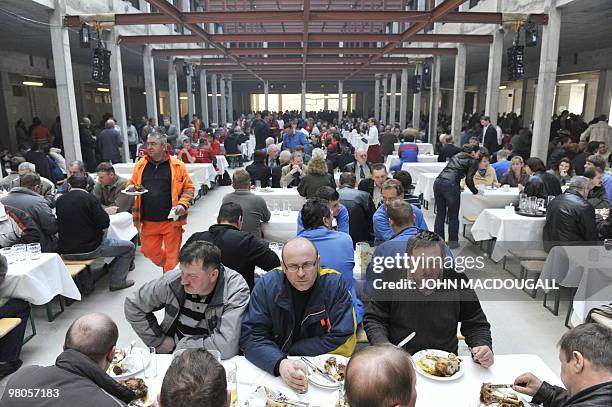 Workers take part in a banquet during a topping-out ceremony for the new German Intelligence service building March 25, 2010 in Berlin. The new...