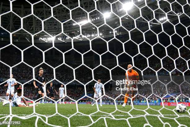 Ivan Rakitic of Croatia scores his team's third goal past Wilfredo Caballero of Argentina during the 2018 FIFA World Cup Russia group D match between...