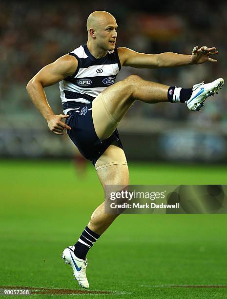 Gary Ablett of the Cats kicks for goal during the round one AFL match between the Geelong Cats and the Essendon Bombers at Melbourne Cricket Ground...