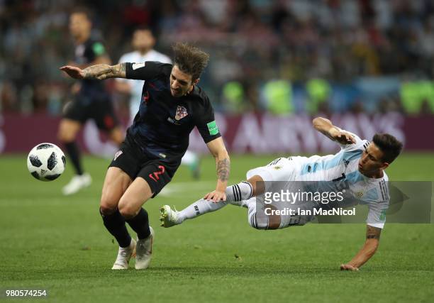 Sime Vrsaljko of Croatia vies with Maximiliano Meza of Argentina during the 2018 FIFA World Cup Russia group D match between Argentina and Croatia at...