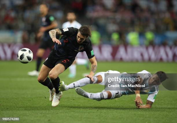 Sime Vrsaljko of Croatia vies with Maximiliano Meza of Argentina during the 2018 FIFA World Cup Russia group D match between Argentina and Croatia at...