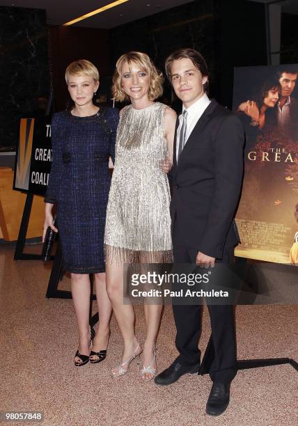 Actress Carey Mulligan, Writer / Director Shana Feste and Actor Johnny Simmons arrives at the Los Angeles premiere of "The Greatest" at Linwood Dunn...