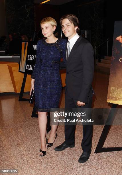 Actors Carey Mulligan and Johnny Simmons arrive at the Los Angeles premiere of "The Greatest" at Linwood Dunn Theater at the Pickford Center for...