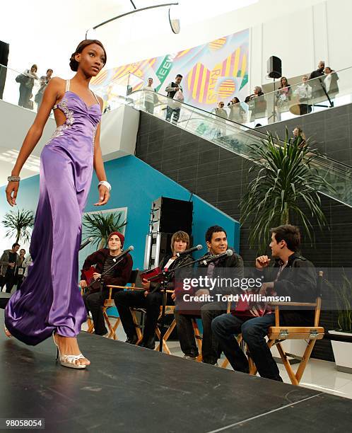 Big Time Rush members Kendall Schmidt, James Maslow, Carlos Pena and Logan Henderson judge dresses at the launch of Prom Season 2010 at JCPenney on...