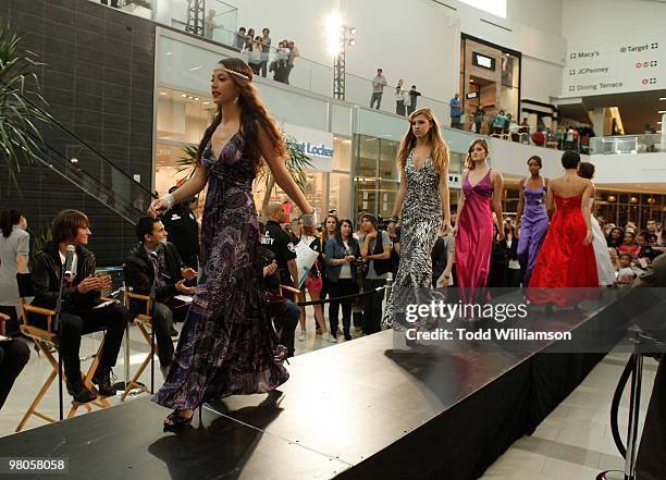 Big Time Rush members Kendall Schmidt, James Maslow, Carlos Pena and Logan Henderson judge dresses at the launch of Prom Season 2010 at JCPenney on...