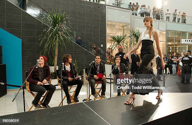 Big Time Rush members Kendall Schmidt, James Maslow, Carlos Pena and Logan Henderson judge dresses at the launch of Prom Season 2010 at JCPenney on...