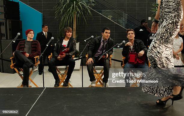 Big Time Rush members Kendall Schmidt, James Maslow, Carlos Pena and Logan Henderson judge dresses at the launch of Prom Season 2010 at JCPenney on...