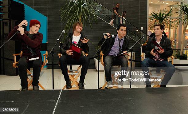 Big Time Rush members Kendall Schmidt, James Maslow, Carlos Pena and Logan Henderson judge dresses at the launch of Prom Season 2010 at JCPenney on...