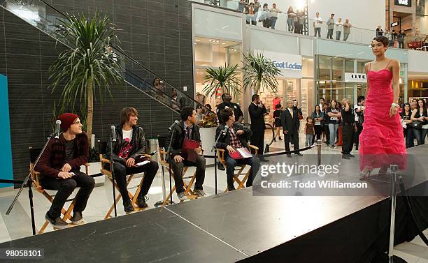 Big Time Rush members Kendall Schmidt, James Maslow, Carlos Pena and Logan Henderson judge dresses at the launch of Prom Season 2010 at JCPenney on...