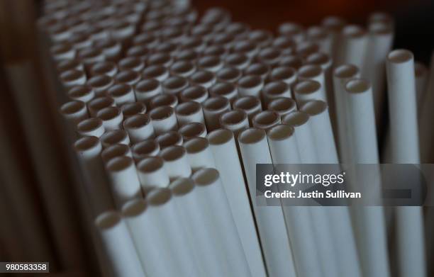 Paper straws sit on the bar at Fog Harbor Fish House on June 21, 2018 in San Francisco, California. San Francisco, Oakland and Berkeley are all...