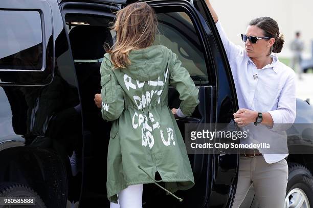 First lady Melania Trump climbs back into her motorcade after traveling to Texas to visit facilities that house and care for children taken from...