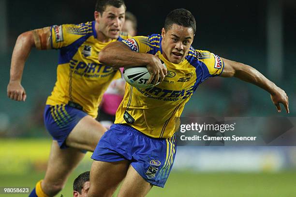 Jarryd Hayne of the Eels is tackled during the round three NRL match between the West Tigers and the Parramatta Eels at Sydney Football Stadium on...