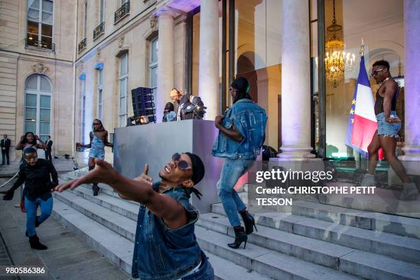 Kiddy Smile and dancers play music during the 'Fete de la Musique', the music day celebration in the courtyard of the Elysee Presidential Palace, in...