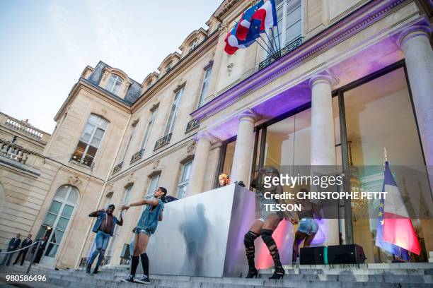 Kiddy Smile and dancers play music during the 'Fete de la Musique', the music day celebration in the courtyard of the Elysee Presidential Palace, in...
