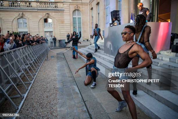 Kiddy Smile and dancers play music during the 'Fete de la Musique', the music day celebration in the courtyard of the Elysee Presidential Palace, in...