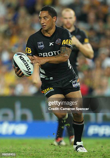 Benji Marshall of the Tigers runs the ball during the round three NRL match between the West Tigers and the Parramatta Eels at Sydney Football...