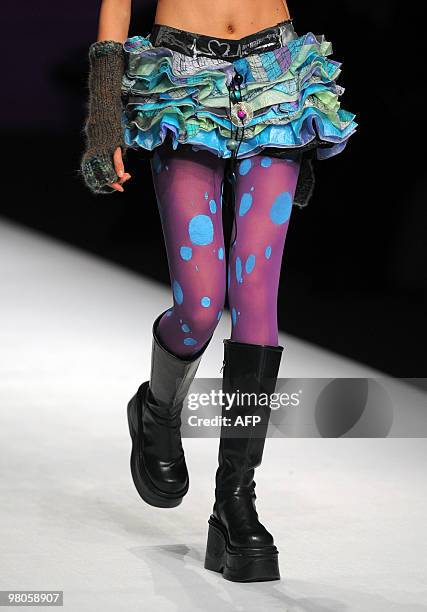 Model presents a creation from the opening ceremony of China Fashion Week Autumn/Winter 2010-2011 and the Hempei Award for the 18th International...