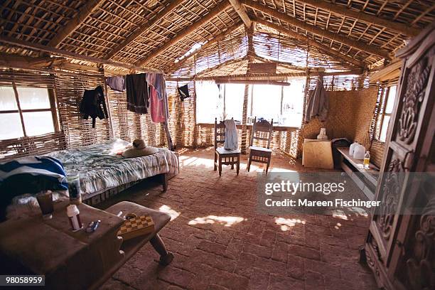 inside of an inhabited beach cabin - mareen fischinger stock pictures, royalty-free photos & images