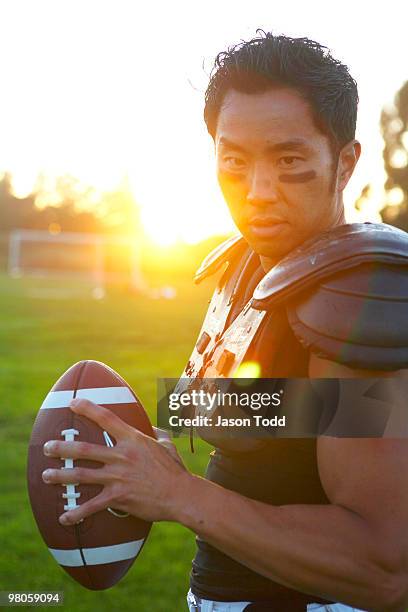 man in football gear with sun shinning  - jason todd bildbanksfoton och bilder