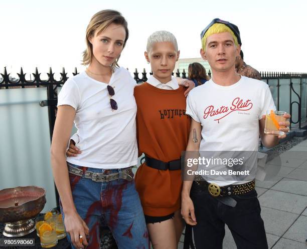 Edie Campbell, Jazzelle Zanaughtti and Louie Banks attend The London EDITION's annual Summer Solstice Dinner Hosted by Edie Campbell and Christabel...