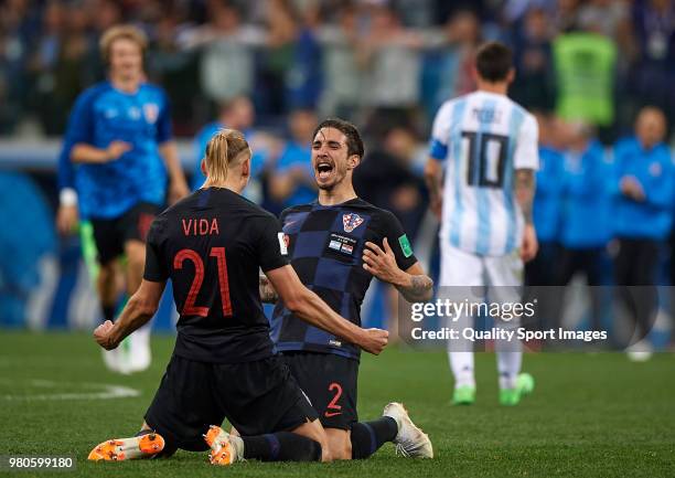 Domagoj Vida and Sime Vrsaljko of Croatia celebrates his team victori at the end of the 2018 FIFA World Cup Russia group D match between Argentina...
