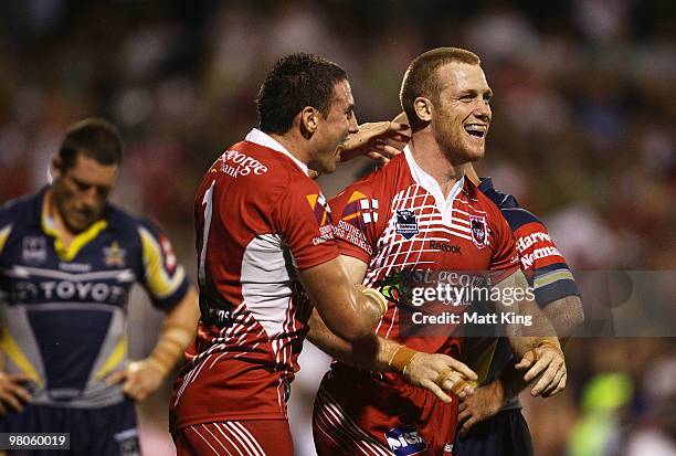 Ben Creagh of the Dragons celebrates with Darius Boyd after scoring a try during the round three NRL match between the St George Dragons and the...