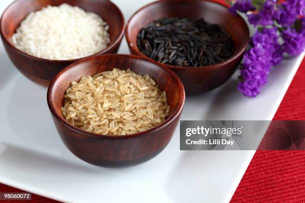 three bowls of rice - viereckiger teller stock-fotos und bilder
