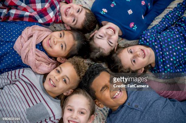 fun group photo - class photo stock pictures, royalty-free photos & images