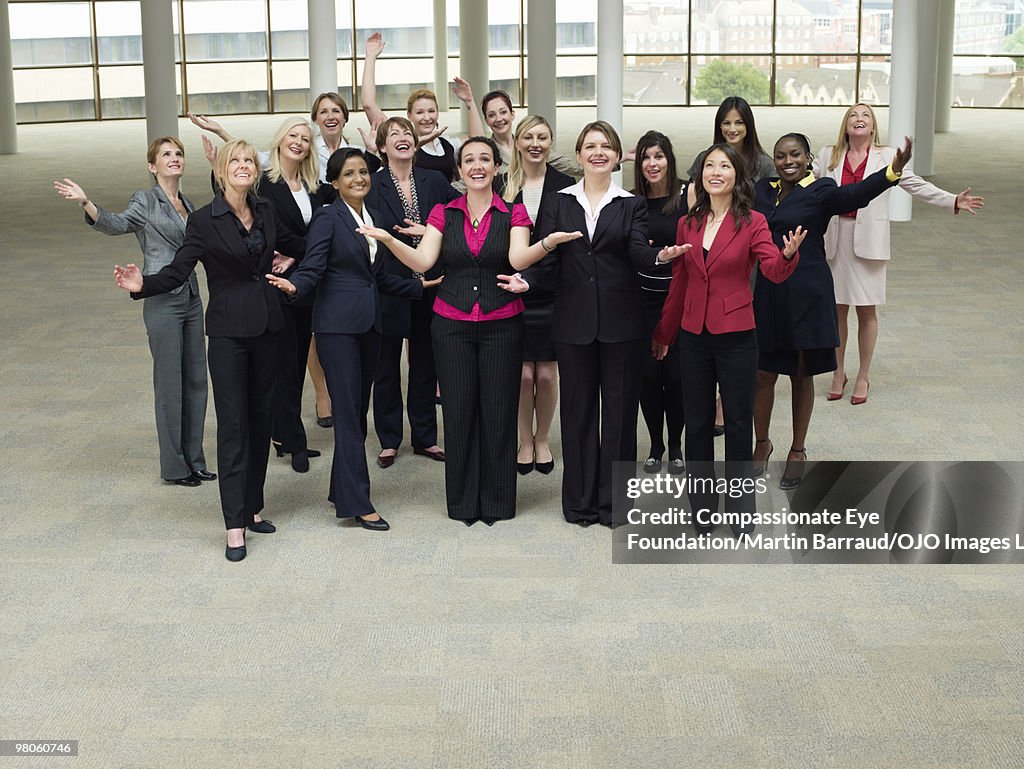 A large group of business women standing together