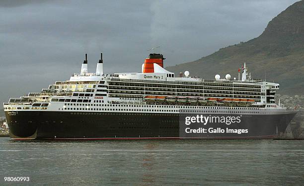 The largest ever ocean liner built, the Queen Mary 2, arrives at Table Bay Harbour in Cape Town on Thursday, 25 March 2010. The 345 metre long ocean...