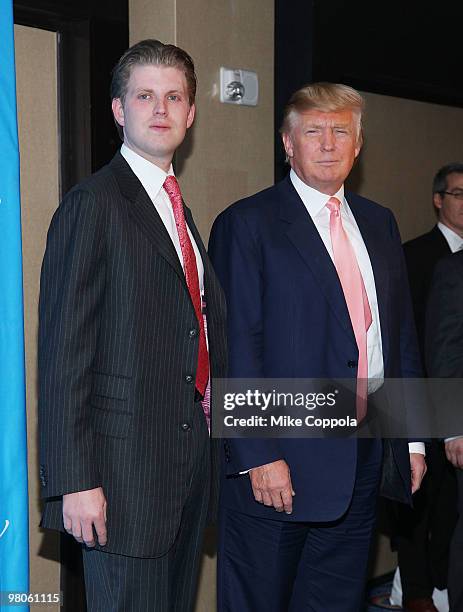 Donald Trump and son Eric Trump attend the Broadway opening of "Come Fly Away" at the Marriot Marquis on March 25, 2010 in New York City.