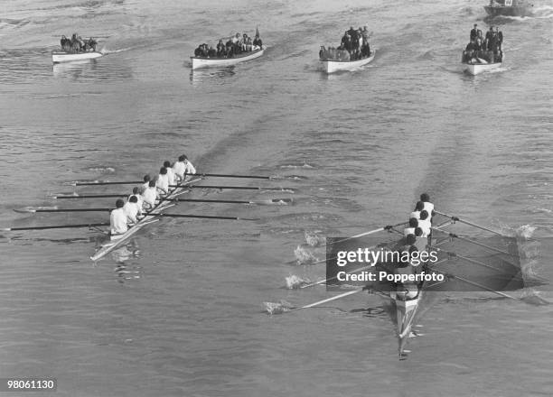 The Oxford and Cambridge crews competing in the 126th Boat Race on the Thames, London, 5th April 1980. Oxford won in a time of 19 minutes, 2 seconds.