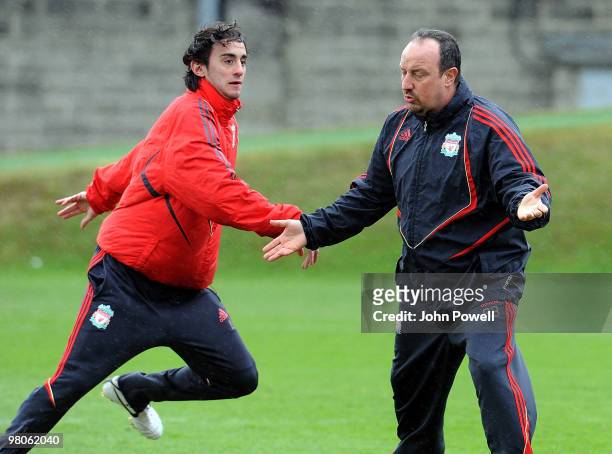 Manager of Liverpool, Rafael Benitez with Alberto Aquilani during a training session at Melwood training ground on March 26, 2010 in Liverpool,...