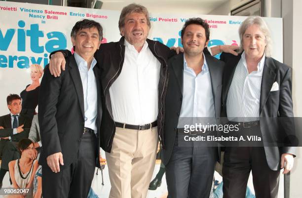 Actors Vincenzo Salemme, Gigi Proietti, Enrico Brignano and producer Enrico Vanzina attend "La Vita E' Una Cosa Meravigliosa" photocall at Adriano...