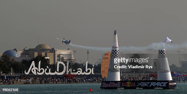 Paul Bonhomme of Great Britain hits a air gate during the Red Bull Air Race Qualifying session on March 26, 2010 in Abu Dhabi, United Arab Emirates.