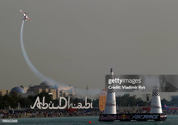 Paul Bonhomme of Great Britain hits a air gate during the Red Bull Air Race Qualifying session on March 26, 2010 in Abu Dhabi, United Arab Emirates.