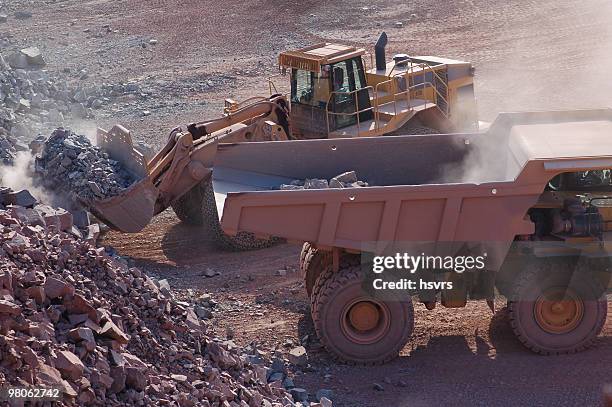 open-pit mine with earth mover and dump truck - open pit mine bildbanksfoton och bilder