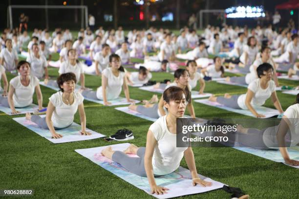 On June 21 local yoga lovers in binzhou city, shandong province, China, held a night yoga activity together.PHOTOGRAPH BY Costfoto / Future Publishing