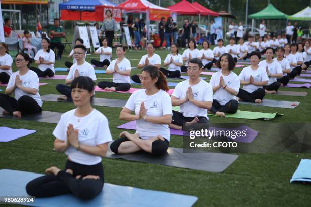 On June 21 local yoga lovers in binzhou city, shandong province, China, held a night yoga activity together.PHOTOGRAPH BY Costfoto / Future Publishing