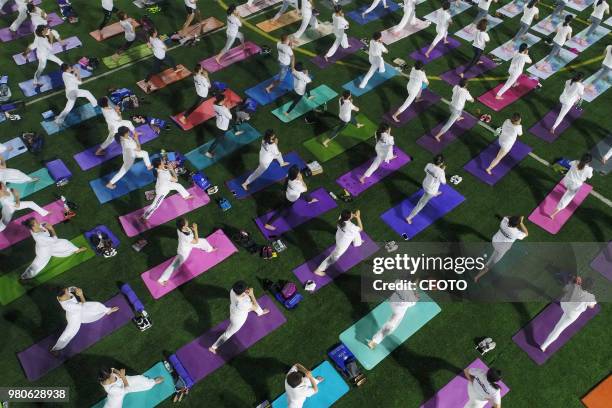 On June 21 local yoga lovers in binzhou city, shandong province, China, held a night yoga activity together.PHOTOGRAPH BY Costfoto / Future Publishing