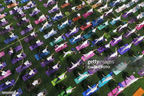 On June 21 local yoga lovers in binzhou city, shandong province, China, held a night yoga activity together.PHOTOGRAPH BY Costfoto / Future Publishing