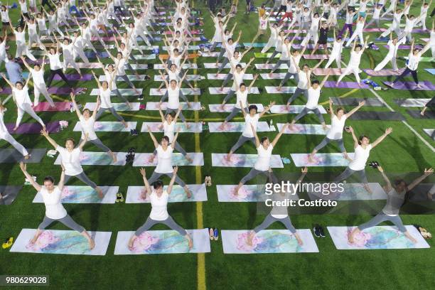 On June 21 local yoga lovers in binzhou city, shandong province, China, held a night yoga activity together.PHOTOGRAPH BY Costfoto / Future Publishing