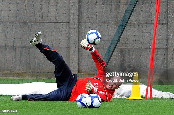 Pepe Reina in action during a training session at Melwood Training Ground on March 26, 2010 in Liverpool, England.