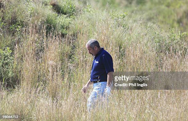 Sam Torrance of Scotland in action during the first round of the Berenberg Bank Masters played over The Links at Fancourt on March 26, 2010 in...