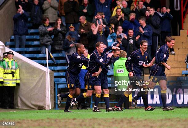 Wimbledon celebrate after Michael Hughes scores the second goal during the Wimbledon v Birmingham City Nationwide First Division match played at...