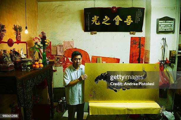 Chinatown, Ting Wee Chia wood carving artist, Malacca and George Town on Penang island have entered the UNESCO World Heritage list as the Malacca...