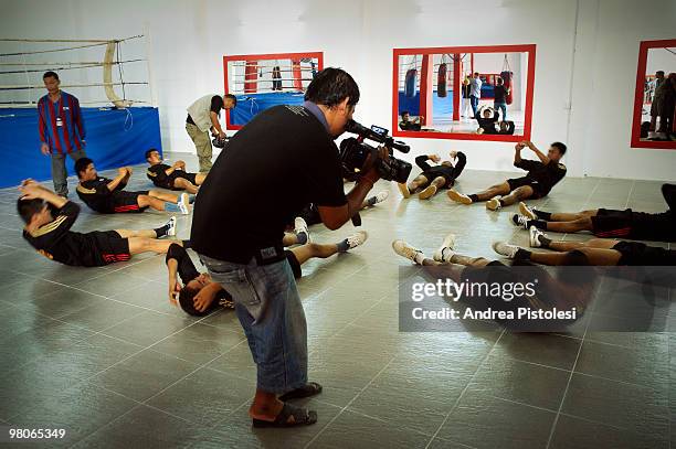 Kun Khmer kick boxing, reality show recording. The fastest changing capital city in south east Asia, in it's way of life more then in architectural...