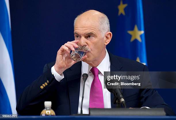 George Papandreou, Greece's prime minister, pauses during a press conference following the European Union Summit in Brussels, Belgium, on Friday,...